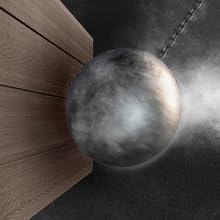 Le texte se lit comme suit : « Image 4 ». Photographie rapprochée de la vapeur ou de la brume expulsée d'une boule métallique sphérique sur fond sombre avec des panneaux de bois.