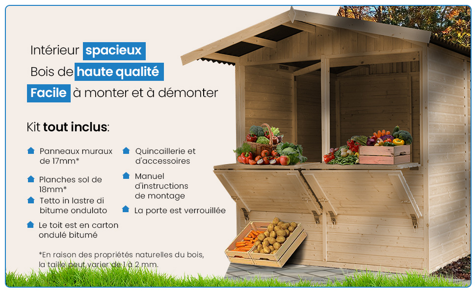 un petit abri de jardin avec une variété de légumes