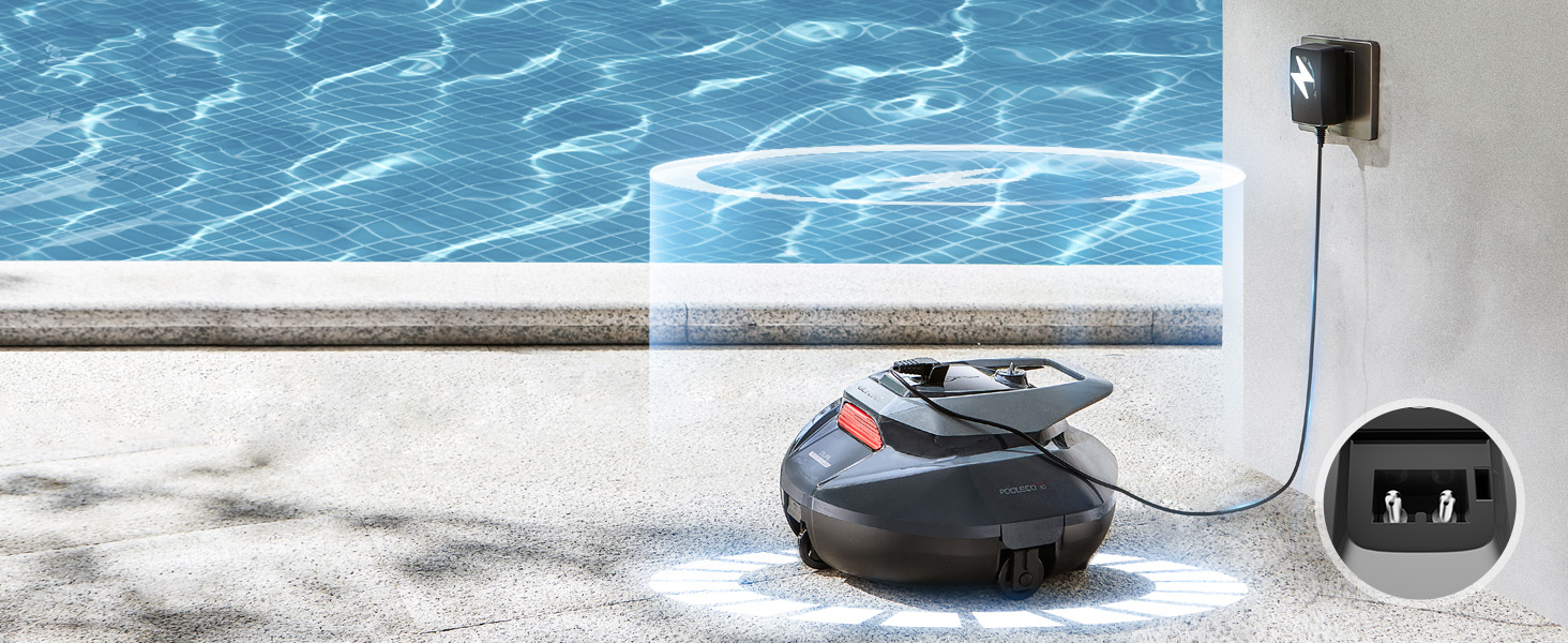 Robot de nettoyage de piscine branché sur une prise électrique, positionné au bord de la piscine avec de l'eau bleue claire.