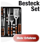 Le texte se lit comme suit : « Besteck Set » et « Mehr Erfahren ». Ensemble d'outils pour barbecue avec poignées noires et accents en bois présentés dans un étui organisé comprenant des spatules et des pinces.