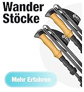 Le texte indique « Wander Stöcke » et « Mehr Erfahren ». Bâtons de randonnée ou de trekking avec poignées en liège et tiges noires sur fond clair.