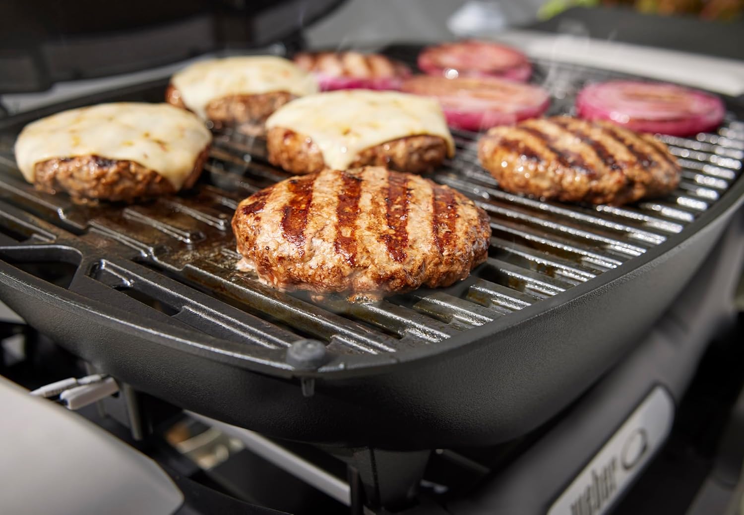 Weber - Q 1100N - compact et léger - grille fonte, allumage électronique, noir