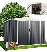 Grand cabanon de rangement ou conteneur en métal avec panneaux verticaux gris foncé, garniture blanche et portes doubles, illustré dans un jardin extérieur.